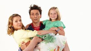 Woodley, flanked by the two wonderful women who help to make this show such a charm.